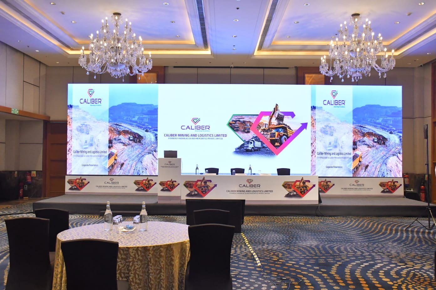 Investor and analyst meet in a hotel ballroom